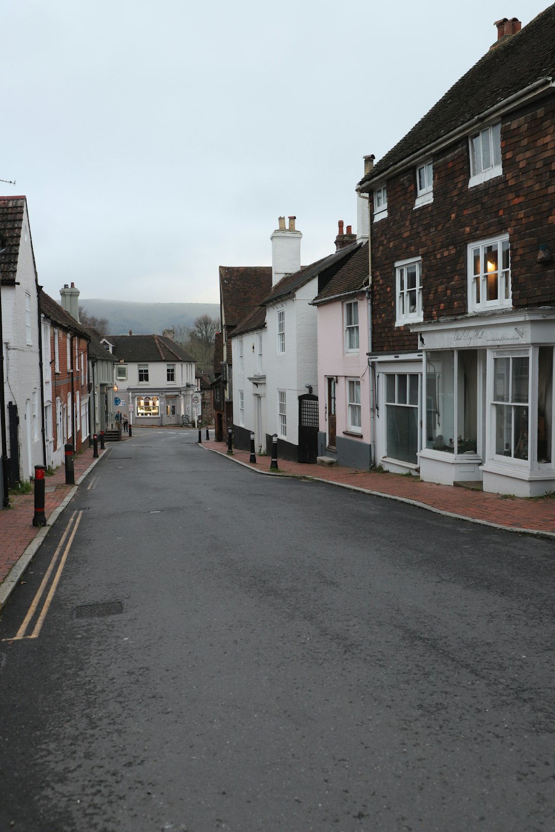 Quiet street lined with traditional houses in a Cumbrian town