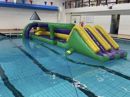 Children enjoying a fun activity session at Penrith Leisure Centre, a great rainy day option near the Lake District